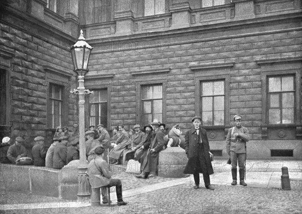 ''La terreur Rouge; La "Bourgeoisie" traquee; groupe d'otages arretes par les Rouges devant..., 1918 Creator: Robert Vaucher.