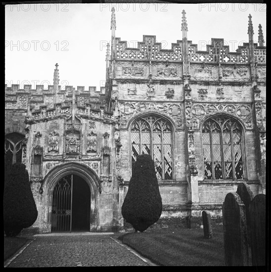 Unidentified church with a highly decorated porch and perforated parapet, England, 1940-1962. Creator: Ethel Booty.