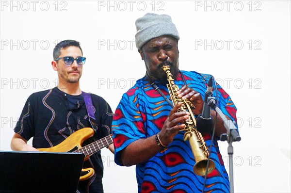 Tony Kofi and Mikele Montolli, Basil Hodge Quintet...Loughton, Essex, 29 Apr 2023. Creator: Brian O'Connor.