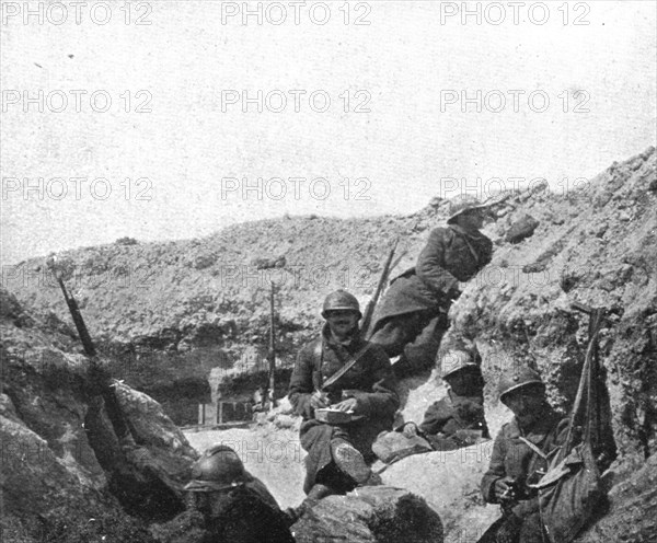 Life in the trenches in Champagne; Calm: "correspondence and cigarettes, 1917. Creator: Unknown.