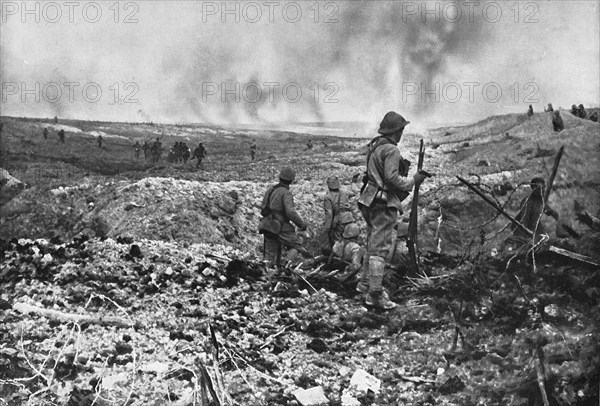 In Champagne: a surprise attack; While part of the group held back to clear the ground..., 1917. Creator: Unknown.