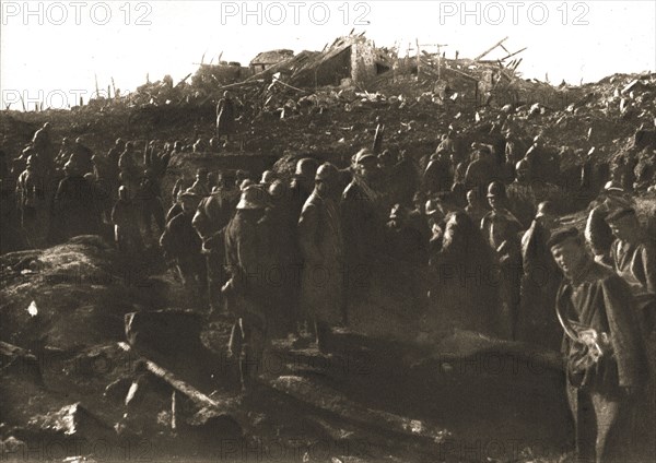 In Recaptured Territory; The evening of October 23, 1917: gathering German prisoners,... 1917. Creator: Unknown.