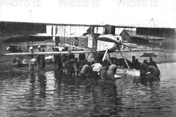 Conquest of GermanEast Africa; Launching a seaplane on Tanganyika with the help of..., 1917. Creator: Unknown.