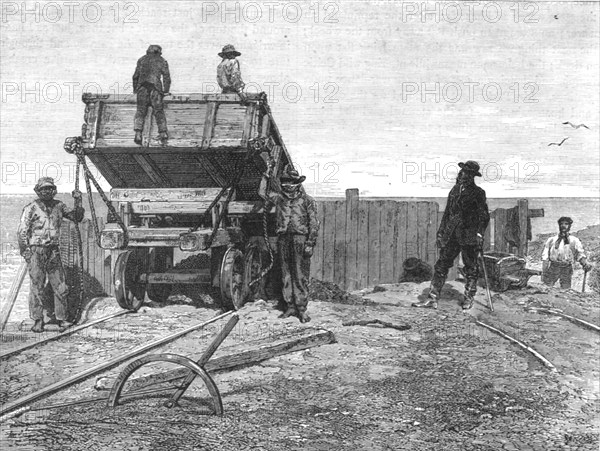 'Discharging Guano-Wagons; About the Chincha Islands', 1875. Creator: Unknown.