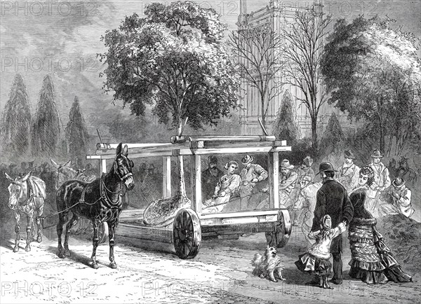 The American Centennial Exhibition at Philadelphia: transplanting trees in the grounds, 1876. Creator: Unknown.