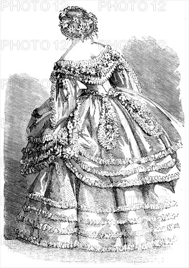 Fashions for November - Robe of White Crape over a slip of White Satin, 1858. Creator: Unknown.