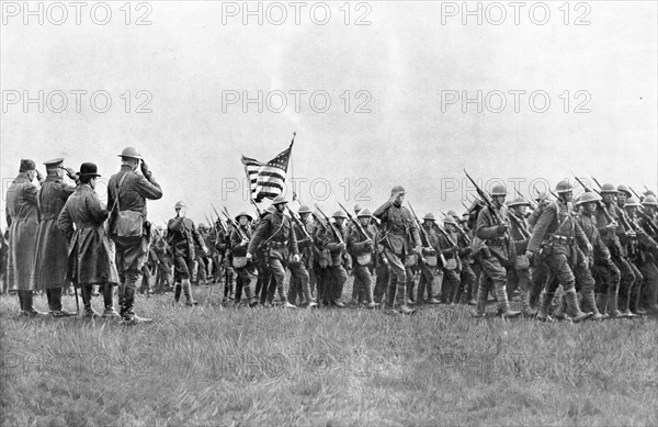 'Les combattants de l'Amerique; Un des premiers regiments Americains engages, le 18th..., 1917. Creator: Unknown.