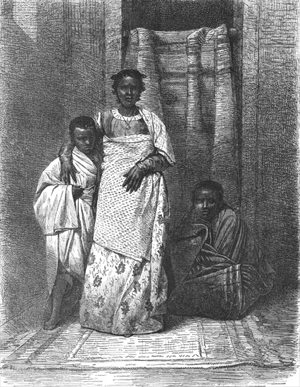 'A Madegasse women and her Children; A Birds-eye View of Madagascar', 1875. Creator: M.D Charnay.