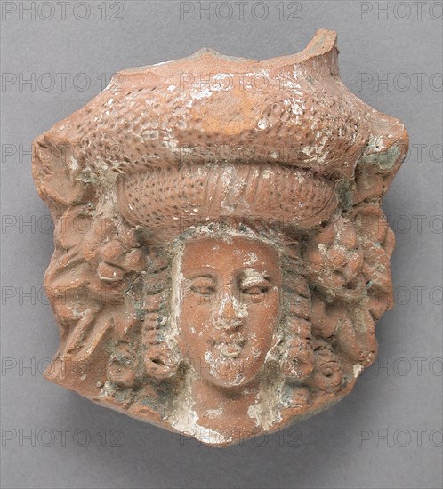 Antefix in the Form of a Female Head, Ptolemaic Period-Roman Period (305 BCE-337 CE). Creator: Unknown.