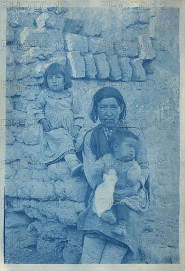 A Pueblo woman with two children (image 1 of 2), c.1890. Creator: Charles Fletcher Lummis.