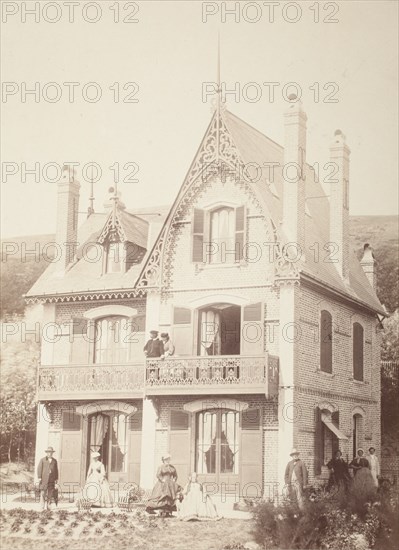 Untitled (Family Portrait-People With House), Printed 1858 circa. Creator: Hippolyte Bayard.