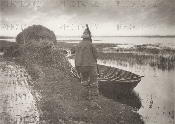 Marshman Going to Cut Schoof-Stuff, 1886. Creator: Peter Henry Emerson.