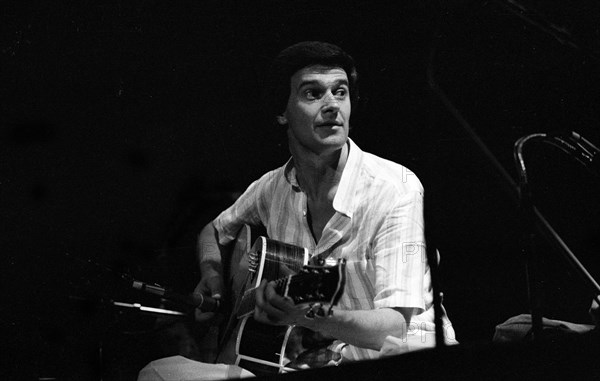 John McLaughlin, London, 1975. Creator: Brian O'Connor.