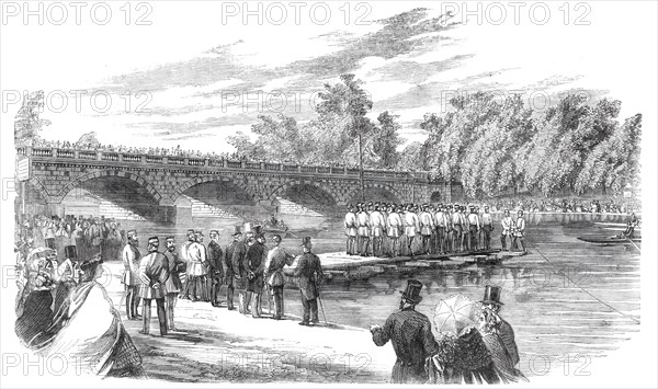 Experiments with Captain Fowke's pontoon bridge on the Serpentine, 1860. Creator: Unknown.