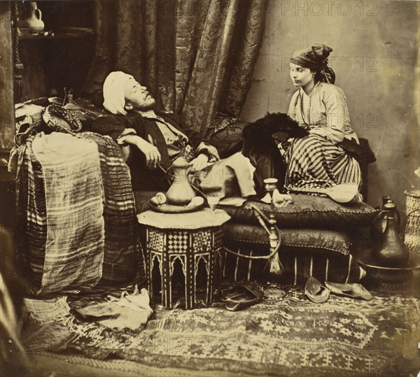 Untitled (Gentleman In Eastern Costume With Nubian Model), 1858. Creator: Roger Fenton.