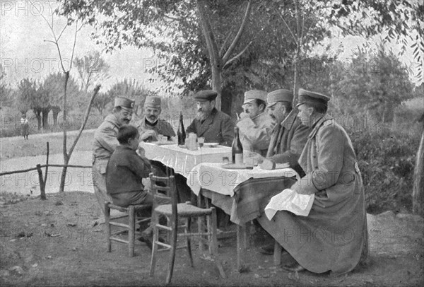 'Alexandre de Serbie au front de Monastir; Le prince Alexandre a fait asseoir a sa table,dresse en p Creator: Vladimir Betzitch.