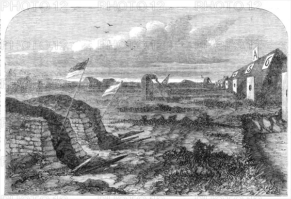 The National Rifle Association meeting on Wimbledon Common: the markers at the butts, 1861. Creator: Unknown.