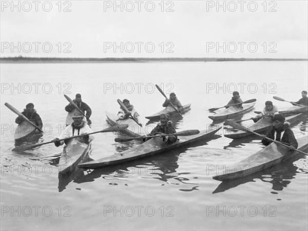 Eskimos in kayaks, Noatak, Alaska, c1929. Creator: Edward Sheriff Curtis.