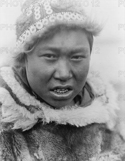 Hooper Bay youth, c1929. Creator: Edward Sheriff Curtis.