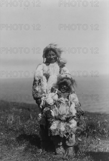 Duck-skin parkas, Nunivak, c1929. Creator: Edward Sheriff Curtis.