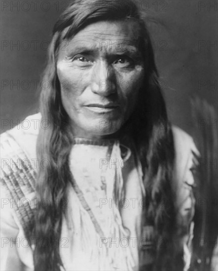 Head Dress-Atsina, c1908. Creator: Edward Sheriff Curtis.