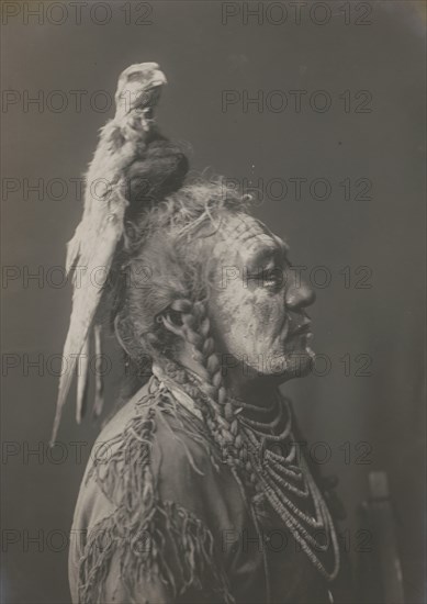 Two Whistles [A]-Apsaroke, c1908. Creator: Edward Sheriff Curtis.