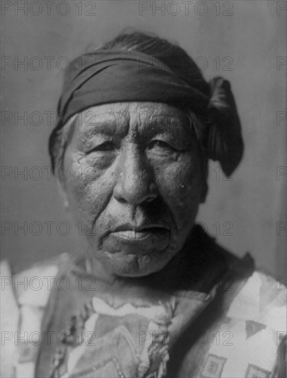 Sitting Owl-Hidatsa, c1908. Creator: Edward Sheriff Curtis.