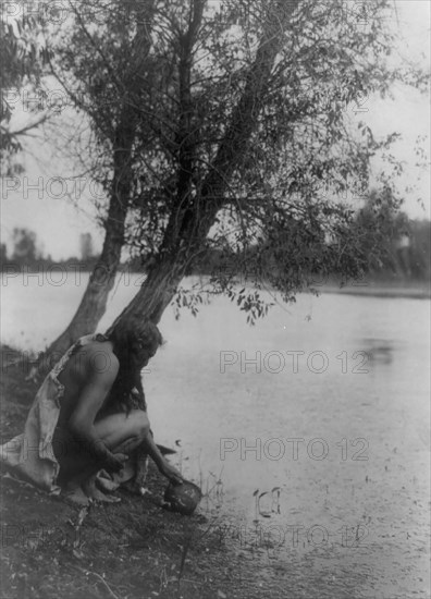 He perceived an earthen vessel, c1908. Creator: Edward Sheriff Curtis.