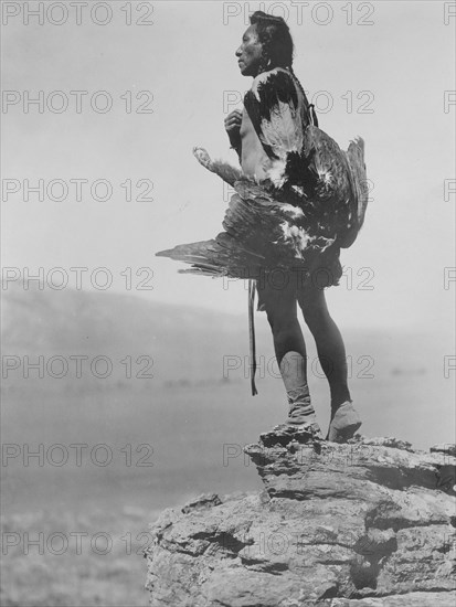 The eagle catcher, c1908. Creator: Edward Sheriff Curtis.