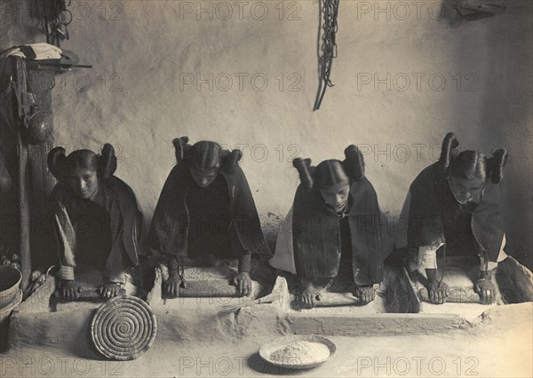 The mealing trough-Hopi, c1906. Creator: Edward Sheriff Curtis.