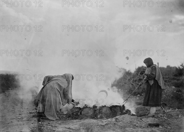 Pottery burners at Santa Clara, c1905. Creator: Edward Sheriff Curtis.