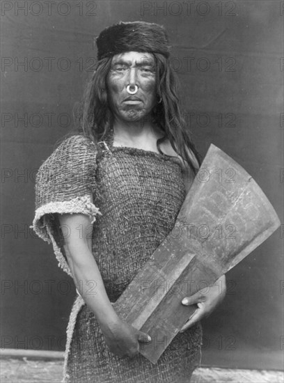 Nakoaktok chief and copper, c1914. Creator: Edward Sheriff Curtis.