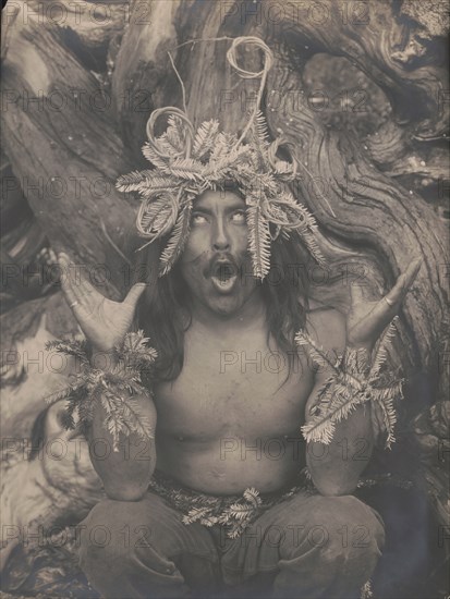 Hamatsa emerging from the woods-Koskimo, c1914. Creator: Edward Sheriff Curtis.