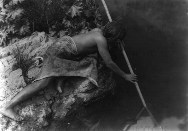 Hupa fisherman, 1923. Creator: Edward Sheriff Curtis.