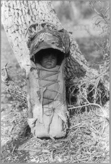 Apache babe in carrier, c1903. Creator: Edward Sheriff Curtis.