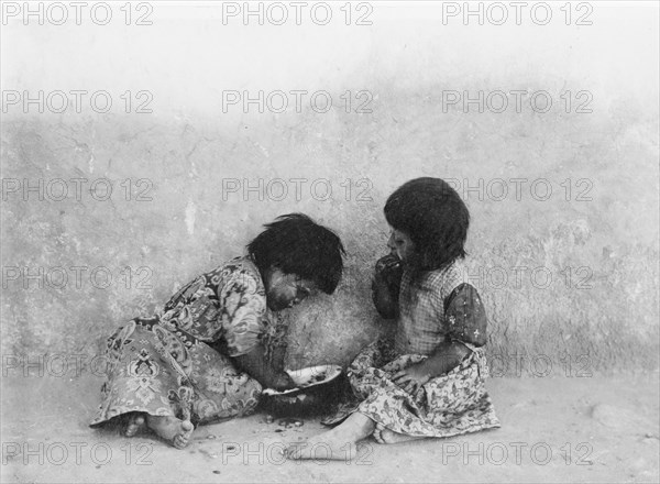 Moki melon eaters, c1900. Creator: Edward Sheriff Curtis.