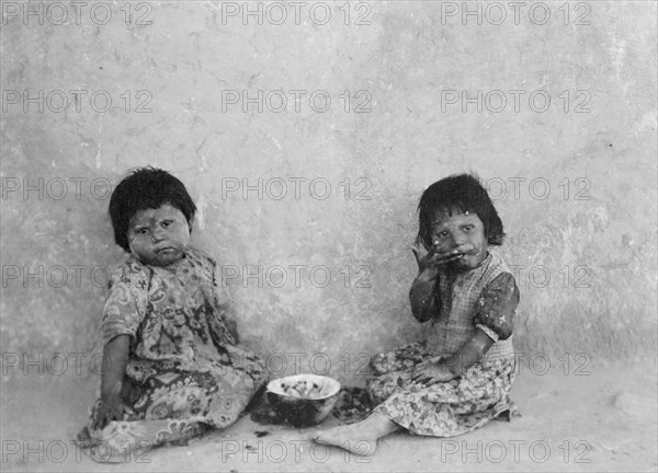 Moki melon eaters, c1900. Creator: Edward Sheriff Curtis.