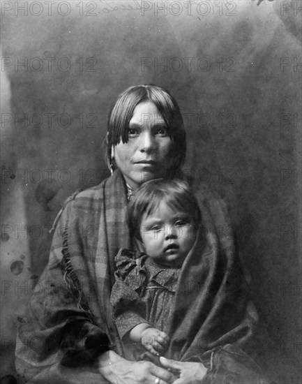 Babe and parent, c1905. Creator: Edward Sheriff Curtis.