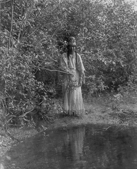 Out of the forests' depths stepped an Indian maiden, c1905. Creator: Edward Sheriff Curtis.