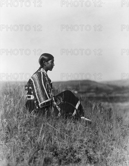 Day dreams-Piegan, c1910. Creator: Edward Sheriff Curtis.