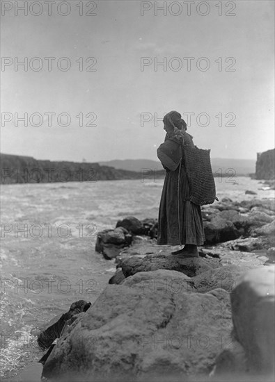 The fish carrier-Wisham (i.e. Wishram), c1910. Creator: Edward Sheriff Curtis.