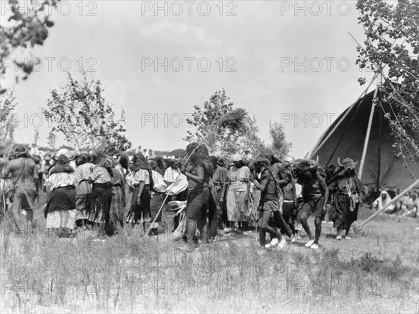 Buffalo Society, animal dance-Cheyenne, c1927. Creator: Edward Sheriff Curtis.