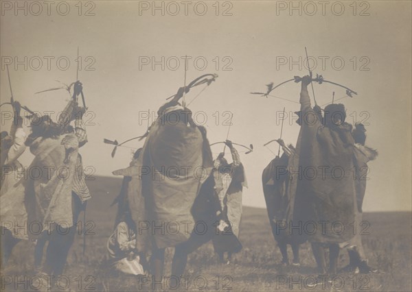 The flight of arrows, c1908. Creator: Edward Sheriff Curtis.