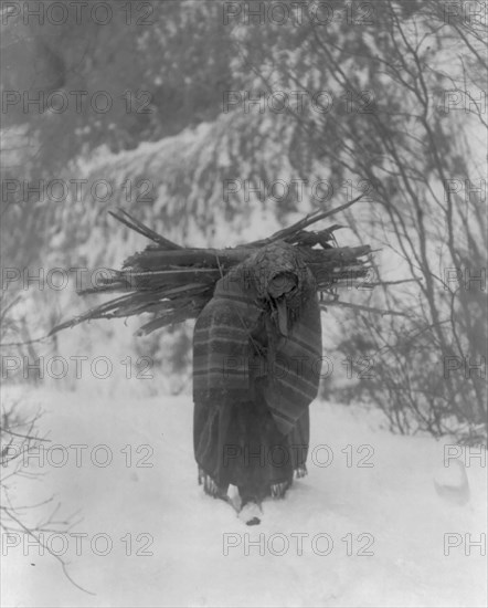 A heavy load, c1908. Creator: Edward Sheriff Curtis.