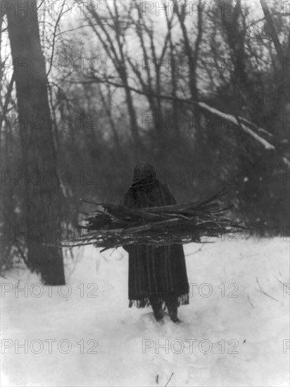 The wood gatherer-Sioux, c1908. Creator: Edward Sheriff Curtis.