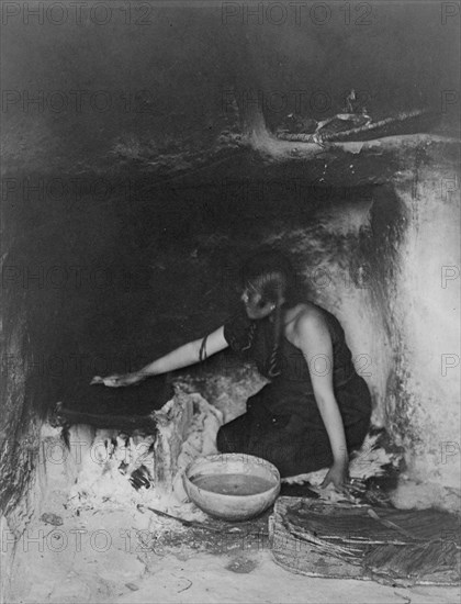 The piki maker-Hopi, c1906. Creator: Edward Sheriff Curtis.