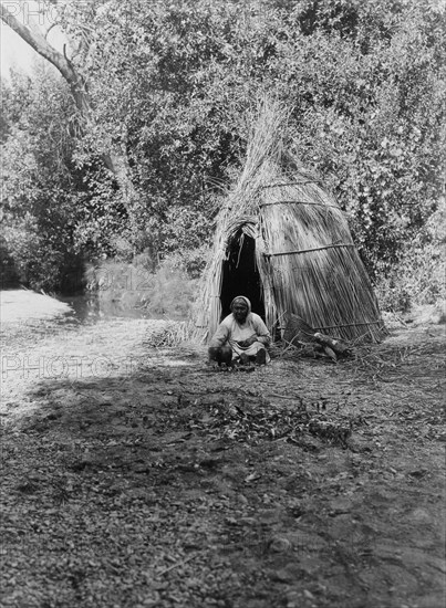 Cooking acorns-upper Lake Pomo, c1924. Creator: Edward Sheriff Curtis.