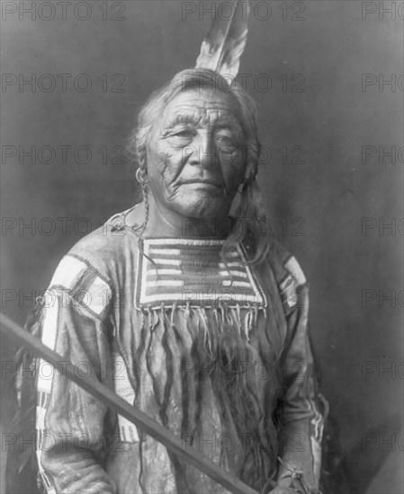 Sitting Elk-Apsaroke, c1908. Creator: Edward Sheriff Curtis.