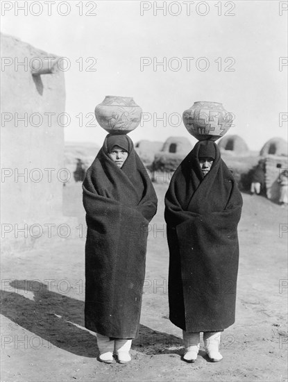 Zuni water carriers, c1903. Creator: Edward Sheriff Curtis.