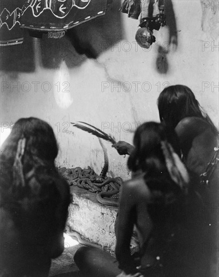 Singing to the snakes, Shipolovi, c1906. Creator: Edward Sheriff Curtis.